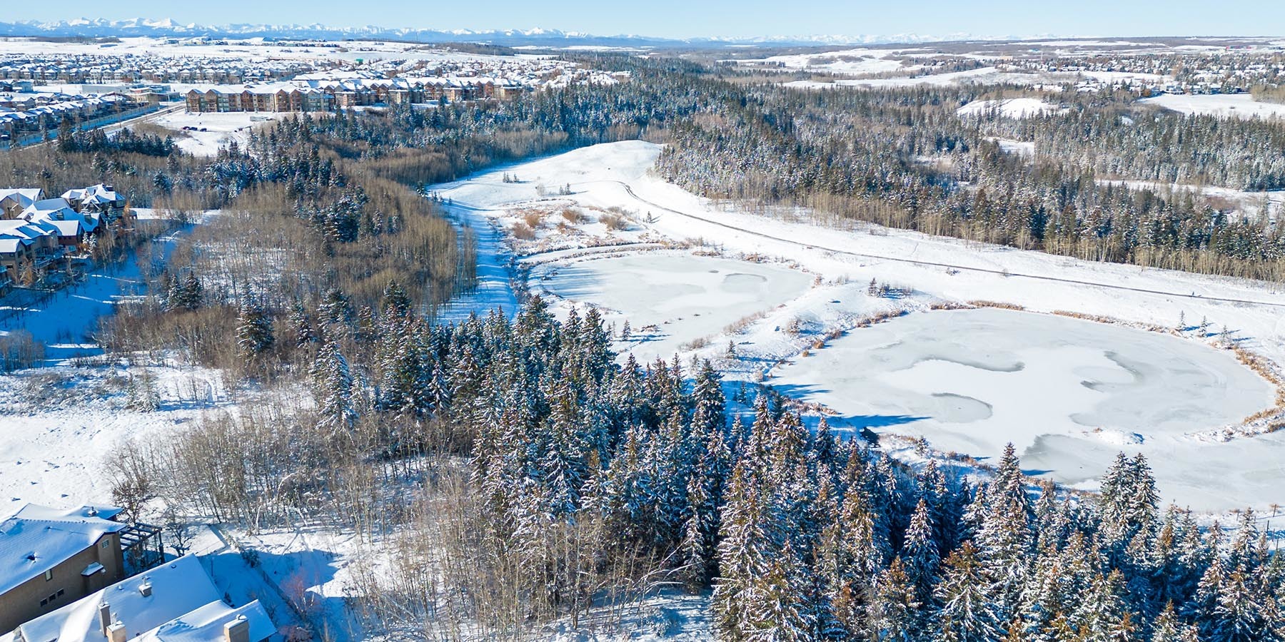 Evergreen, Evergreen Estates Calgary, and Fish Creek Park aerial photograph in winter