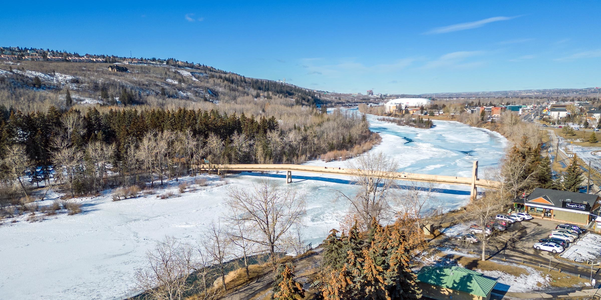 Hillhurst Calgary real estate aerial photo over the Bow River Pathway Bridge